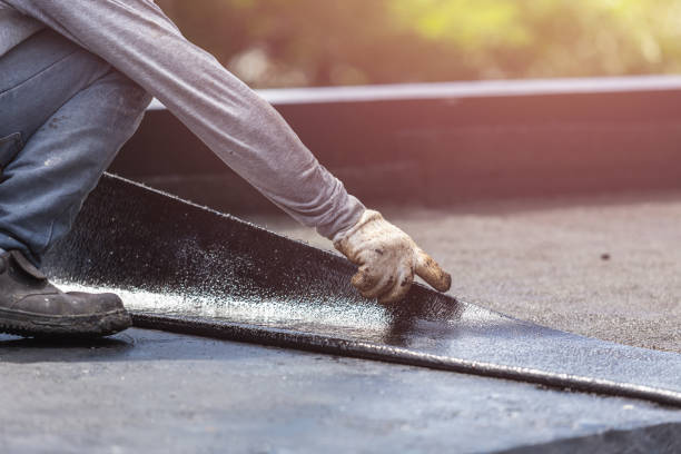 Professional Waterproofing technician working in Tonawanda, NY